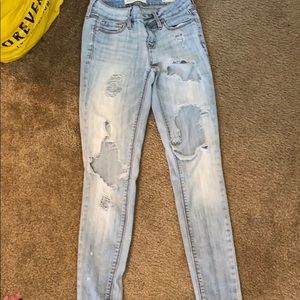 light blue ripped jeans